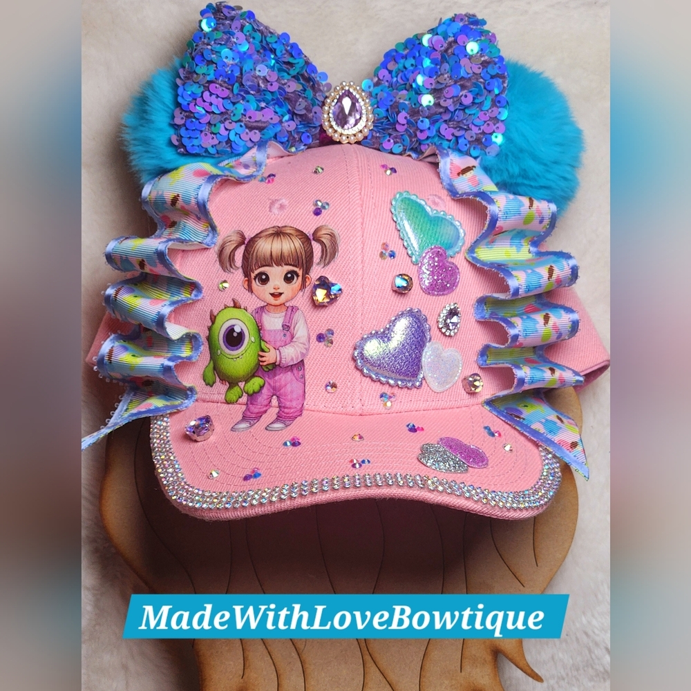 Pink and Blue Whimsical Hat with Pom-Poms